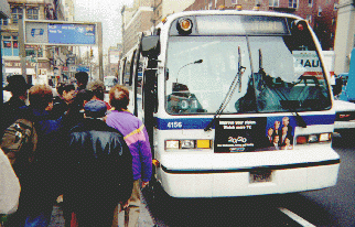 Customers boarding NYCT bus